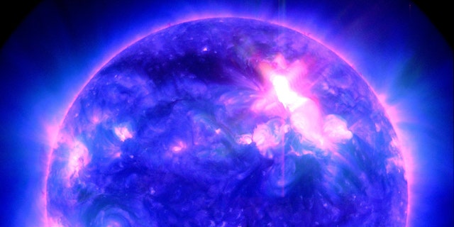 A powerful M9-class solar storm that unleashed a coronal mass ejection toward Earth in the early hours of Jan. 23, 2012 (GMT).