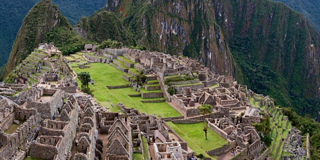 Machu Picchu (Quechua: Machu Picchu) â "Old Mountain", is a pre-Columbian Inca site located 2,430 metres (7,970 ft) above sea level. It is situated on a mountain ridge above the Urubamba Valley in Peru, which is 80 kilometres (50 mi) northwest of Cuzco and through which the Urubamba River flows. Most archaeologists believe that Machu Picchu was built as an estate for the Inca emperor Pachacuti (1438â1472). Often referred to as "The Lost City of the Incas", it is perhaps the most familiar icon of the Inca World. Machu Picchu was declared a Peruvian Historical Sanctuary in 1981 and a UNESCO World Heritage Site in 1983. Since it was not plundered by the Spanish when they conquered the Incas, it
is especially important as a cultural site and is considered a sacred place.