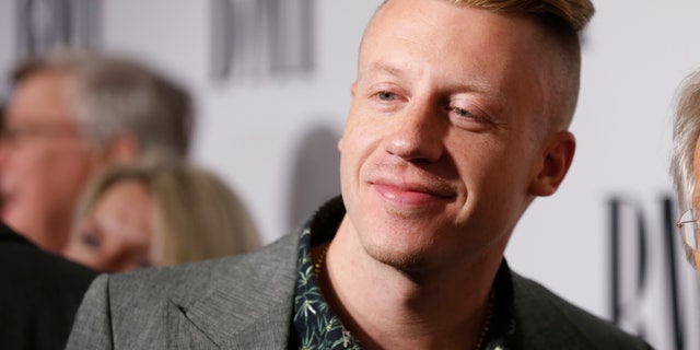 Musician Macklemore poses at the 62nd Annual BMI Pop Awards in Beverly Hills, California, May 13, 2014.