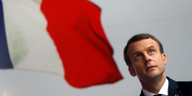 French President Emmanuel Macron attends a ceremony to start the construction of the first metro line in Abidjan, Ivory Coast, November 30, 2017. REUTERS/Philippe Wojazer - RC1899E05B90