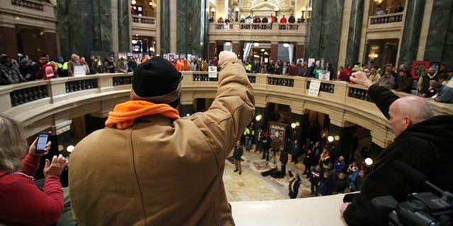 March 5, 2015: A crowd rallies inside the Wisconsin State Capitol as the state Assembly debates the right-to-work bill in Madison, Wis.