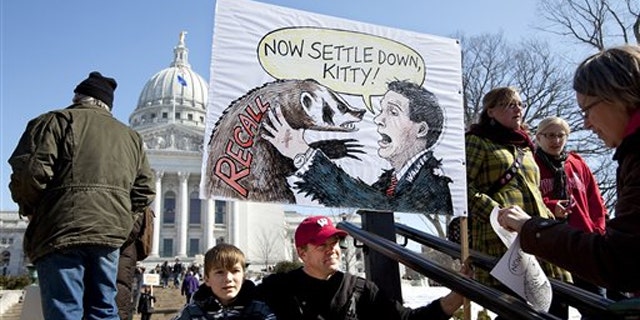 Protesters gather outside the Capitol in Madison, Wis., March 10.