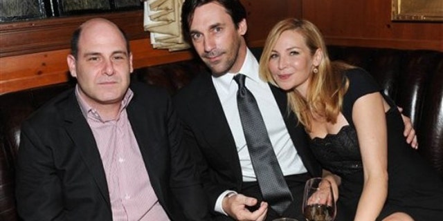Series creator and executive producer Matthew Weiner, left, and actor Jon Hamm and actress Jennifer Westfeldt attend the 'Mad Men' Season 4 Finale screening at the 21 Club in New York City
