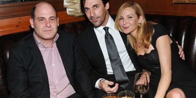 Series creator and executive producer Matthew Weiner, left, and actor Jon Hamm and actress Jennifer Westfeldt attend the 'Mad Men' Season 4 Finale screening at the 21 Club in New York City