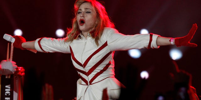 U.S. singer Madonna performs during her concert in St. Petersburg, Russia, Thursday, Aug. 9, 2012. (AP Photo/ Alexander Demianchuk, Pool)