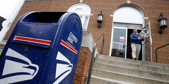 A man leaves the U.S. post office in Blacksburg, Virginia April 19, 2007.