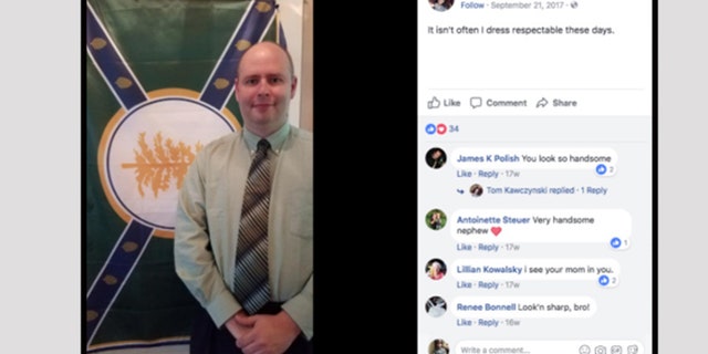Jackman Town Manager Tom Kawczynski poses in front of his flag for his New Albion racial segregationist group on his Facebook page.