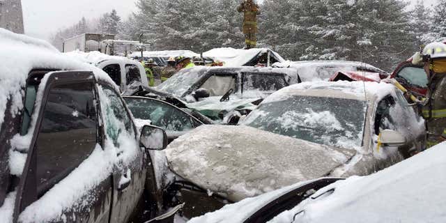 Feb. 25, 2015: Emergency personnel respond to a multi-vehicle pileup along Interstate 95 in Etna, Maine.