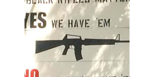 The sign, on a private lawn, has sparked controversy in the land of blueberries, pine trees and lobster.