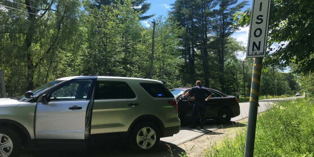 State police in Madison, Maine, have closed the country road Wednesday, July 5, 2017, where a series of Wednesday shootings left three victims dead and one injured.