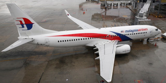 FILE: A Malaysia Airlines Boeing 737-800 plane sits on tarmac at Kuala Lumpur International Airport in Sepang, Malaysia.