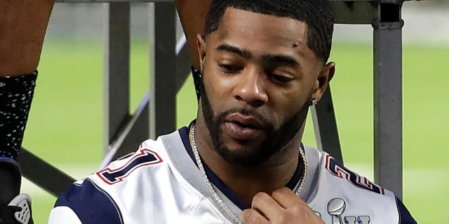 New England Patriots cornerback Malcolm Butler waits for team photo ahead of Super Bowl XLII.