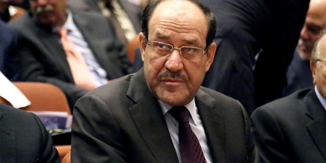 July 1, 2014: Iraqi Prime Minister Nouri al-Maliki, attends the first session of parliament in the heavily fortified Green Zone in Baghdad, Iraq. (AP)