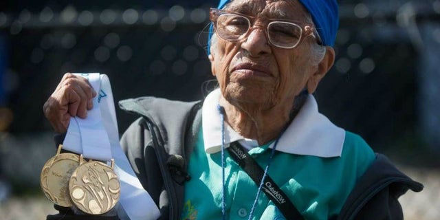 Man Kaur with gold medals in 2016.