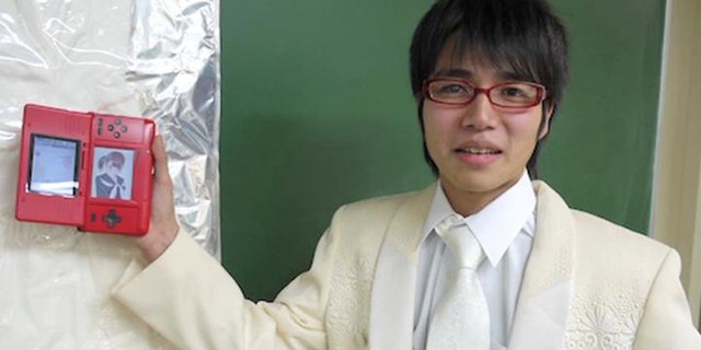 In this screen from a YouTube video of the wedding ceremony, gamer Sal9000 shows off the love of his life -- Nene Anegasaki, the star of dating simulation game Love Plus.