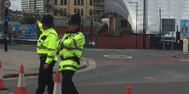 Police at the scene of the terror attack at the Manchester Arena in Britain.