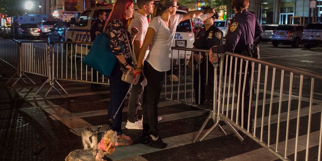 Sept. 18, 2016: People try to access the area near the scene of an explosion on West 23rd Street and 6th Avenue in Manhattan's Chelsea neighborhood.