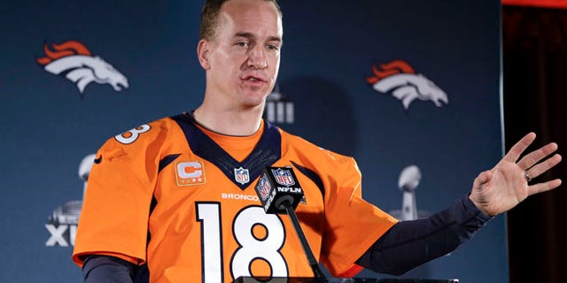 Jan 30, 2014: Denver Broncos quarterback Peyton Manning talks with reporters during a news conference in Jersey City, N.J.