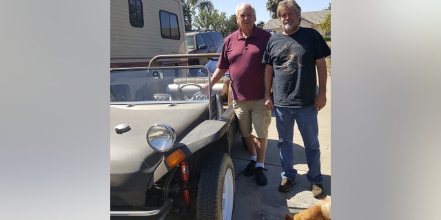 Don Martin (R) inherited the buggy from his stepfather, who bought it from Don Graves (L).