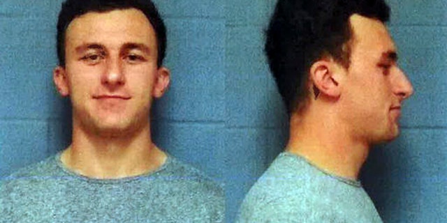 This booking photo provided by the Highland Park, Texas, Department of Public Safety, shows former Cleveland Browns quarterback Johnny Manziel, who was booked and posted bond Wednesday, May 4, 2016, in a domestic violence case, one day before he faces his first court hearing. The Heisman Trophy winner and former Texas A&M star was indicted by a grand jury last month after his ex-girlfriend alleged he hit her and threatened to kill her during a night out in January. (AP Photo/Highland Park Department of Public Safety)