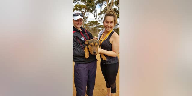 "This dog is walking around, making itself known to all the runners," Allison Hunter told local ABC News. "We get the air horn out and say, 'Go,' and off he goes with everybody."