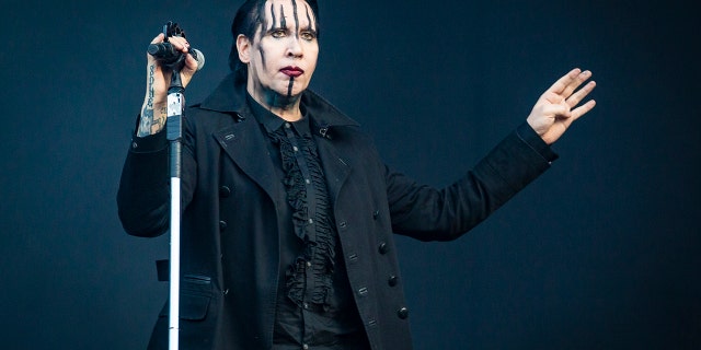 Marilyn Manson  turned himself into authorities in Los Angeles in connection to assault charges he is facing in New Hampshire, Fox News has confirmed.