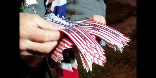 Stephens, who is a blacksmith by trade, wears around his neck red, white and blue ribbons inscribed with the name of military men and women in his thoughts.