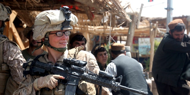 FILE: August 18, 2010: A female Marine in Marjah, Afghanistan.