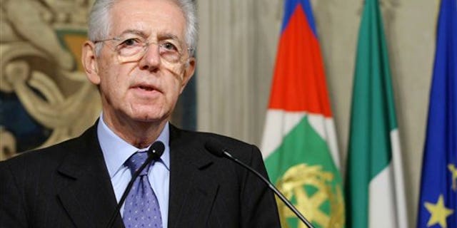 Nov. 13, 2011: Italy's new premier-designate economist Mario Monti meets with journalists at the Quirinale Presidential Palace after talks with Italian President Giorgio Napolitano in Rome. Monti told reporters Sunday night he will carry out the task "with a great sense of responsibility and service toward this nation."