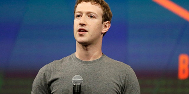 April 30, 2014: Facebook CEO Mark Zuckerberg gestures while delivering the keynote address at the f8 Facebook Developer Conference in San Francisco.