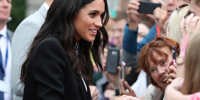 Meghan, Duchess of Sussex, visits Trinity college, in Dublin, Ireland, Wednesday, July 11, 2018.