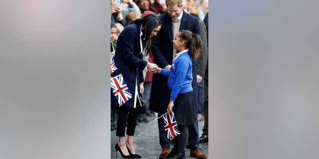 Markle meets student, Sophia Richards in Birmingham, England.