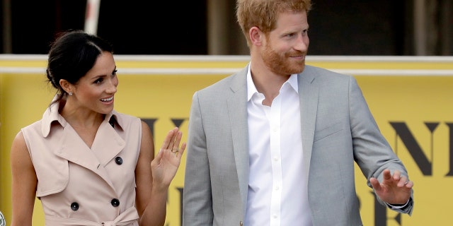 The Duke and Duchess of Sussex were snapped while pay tribute to the Nelson Mandela exhibition in London on Tuesday.