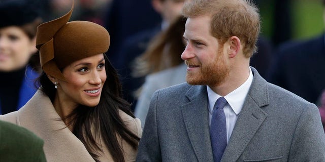 Meghan Markle and Prince Harry stopped to talk to people while walking to the queen's residence.