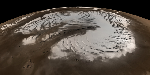 This true-color image of Mars’ north pole incorporates data from NASA’s Mars Global Surveyor spacecraft.