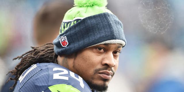 Marshawn Lynch #24 of the Seattle Seahawks looks on before the NFC Divisional Playoff Game against the Carolina Panthers at Bank of America Stadium on January 17, 2016 in Charlotte, North Carolina.