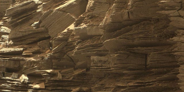 This closeup view from NASA's Curiosity rover shows finely layered rocks on Mars, deposited by wind long ago as migrating sand dunes.