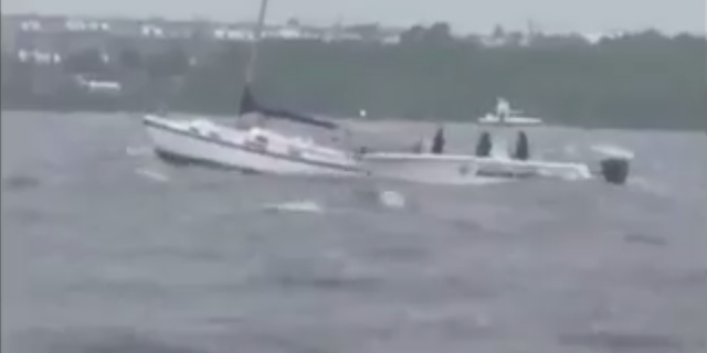 Deputies rescued the couple stuck at sea on Sunday.