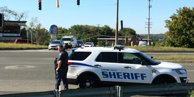 Police respond to a shooting at a business park in the Edgewood area of Harford County, Md., Wednesday, Oct. 18, 2017. (Kenneth K. Lam/The Baltimore Sun via AP)