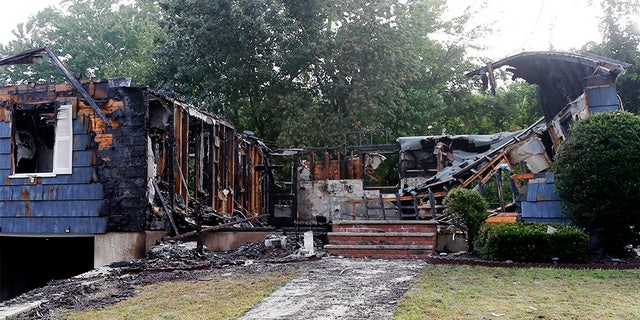 A damaged house in Lawrence, Mass., on Friday morning following gas explosions in the area.