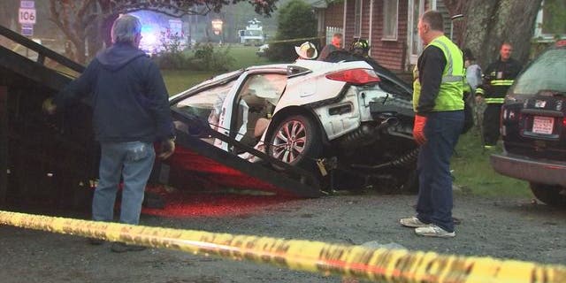 Four teenagers were killed in a violent car crash on Saturday south of Boston.