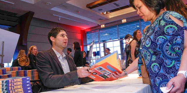 Author Matt De La Pena in a book signing on April 16, 2015 in New York City.