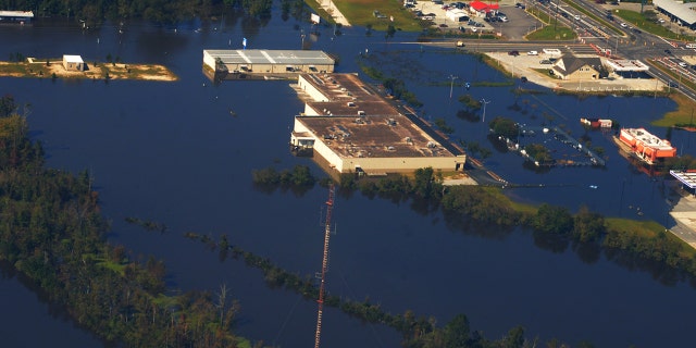 Oct. 12, 2016: Water flows across Highway 11 South near Skinner's Bypass after Hurricane Matthew.
