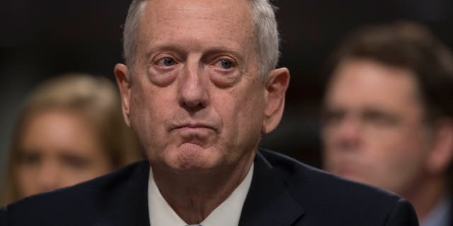 FILE - In this Jan. 12, 2017 file photo, Defense Secretary-designate James Mattis listens on Capitol Hill in Washington while testifying at his confirmation hearing before the Senate Armed Services Committee. Some of President-elect Donald Trumps most important Cabinet choices are at odds with him on matters that were dear to his heart as a campaigner and central to his promises to supporters. For the Pentagon, the CIA, the State Department and more, Trump has picked people who publicly disagree with him on some cornerstones of his agenda In confirmation hearings. (AP Photo/J. Scott Applewhite, File)