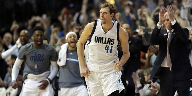 DALLAS, TX - MARCH 07: Dirk Nowitzki #41 of the Dallas Mavericks runs down court after scoring his 30,000 career point in the second quarter against the Los Angeles Lakers at American Airlines Center on March 7, 2017 in Dallas, Texas. NOTE TO USER: User expressly acknowledges and agrees that, by downloading and/or using this photograph, user is consenting to the terms and conditions of the Getty Images License Agreement. (Photo by Ronald Martinez/Getty Images)