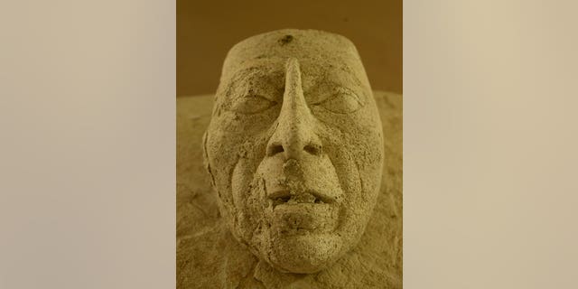 The stucco mask that is believed to depict "Pakal the great" (Héctor Montaño, INAH)