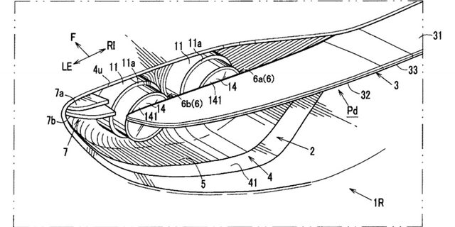 Patent drawings depict the retractable spoiler bisecting the taillights.