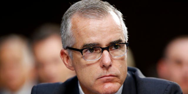FILE - In this June 7, 2017, file photo, FBI acting director Andrew McCabe listens during a Senate Intelligence Committee hearing about the Foreign Intelligence Surveillance Act, on Capitol Hill in Washington. McCabe drafted a memo on the firing of his onetime boss, ex-director James Comey. Thatâs according to a person familiar with the memo, who insisted on anonymity to discuss a secret document that has been provided to special counsel Robert Mueller. The person said the memo concerned a conversation McCabe had with Deputy Attorney General Rod Rosenstein about Rosensteinâs preparations for Comeyâs firing. (AP Photo/Alex Brandon, File)