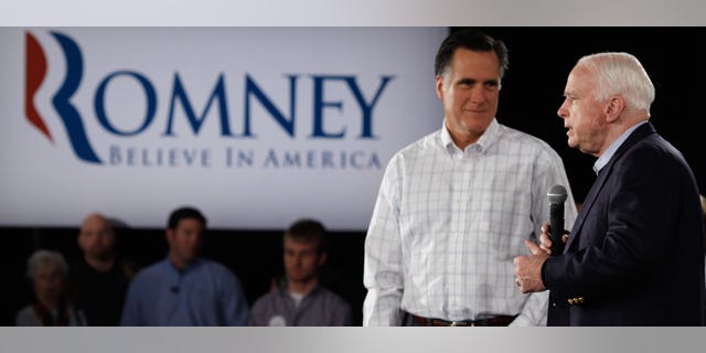 SALEM, NH - JANUARY 05: Republican presidential candidate, former Massachusetts Governor Mitt Romney (L) and Sen. John McCain (R-AZ) hold a campaign town hall meeting at the Boys and Girls Club January 5, 2012 in Salem, New Hampshire. McCain, the GOP presidential nominee who ran against President Barack Obama in 2008, endorsed Romney on Wednesday. Romney eeked out an eight-vote victory in the Iowa Caucuses against former U.S. Senator Rick Santorum, who is also stumping in New Hampshire. (Photo by Chip Somodevilla/Getty Images)
