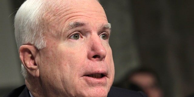 Sen. John McCain, R-Ariz., the ranking Republican on the Senate Armed Services Committee, addresses Gen. David Petraeus, commander of U.S. and NATO forces in Afghanistan, as he testifies before the committee, on Capitol Hill in Washington, Tuesday, March 15, 2011. (AP)